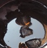 Drum with oily substance